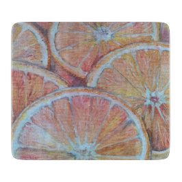 Sinaasappels in plakjes snijplank