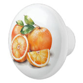 Sinaasappels in plakken en in gehele vorm keramische knop (Rechts)