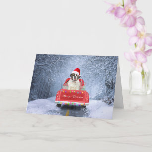 Sint Bernard-hond in de sneeuw zittende Kersttruck Kaart