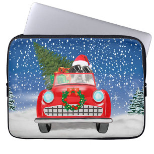 Sint Bernardhond rijdt auto in sneeuw met Kerst  Laptop Sleeve