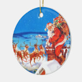 Sinterklaas omhoog op de dak in de sneeuw keramisch ornament (Links)