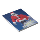 Sinterklaas op de skis die van een kraanhuis sprin notitieblok (Schuin)