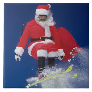 Sinterklaas op de skis die van een kraanhuis sprin tegeltje