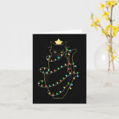 Sinterzwarte kat omhoog gedraaid in kerstboomverli kaart (Gele Bloem)
