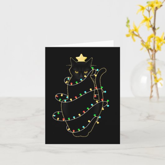 Sinterzwarte kat omhoog gedraaid in kerstboomverli kaart (Gele Bloem)
