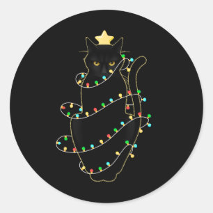 Sinterzwarte kat omhoog gedraaid in kerstboomverli ronde sticker