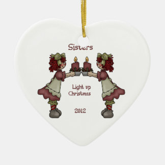 Sisters lichten kerstmis op keramisch ornament