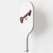 Sitar cartoon illustratie pickleball paddle (Links)