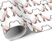 Sittig bitty Siamese katten die papier verpakken (Rol Hoek)