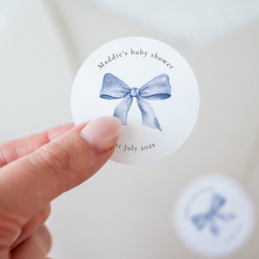 Sjabloon voor baby shower-sticker met blauwe strik ronde sticker