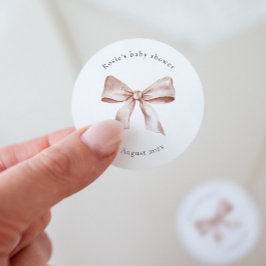 Sjabloon voor baby shower-sticker met roze strik ronde sticker
