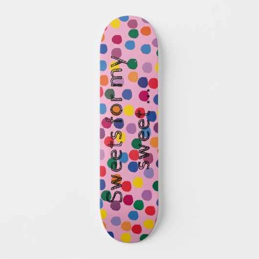 Skateboard mit bunten Punkten und rosa Hintergrund (Voorkant)