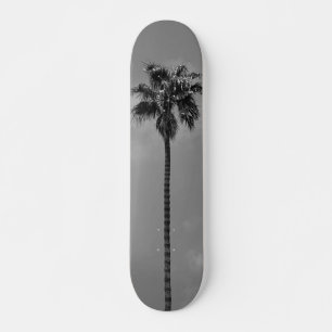 Skateboard van de zwarte en witte palmboom