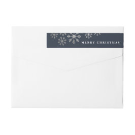 Skatteuse sneeuwomslag rond het etiket van het ter