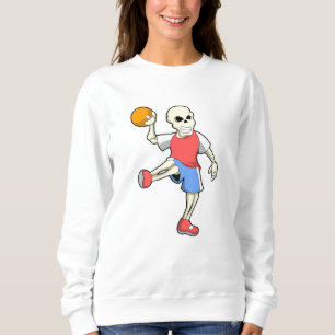 Skelet bij handbalspeler met handbal trui