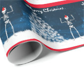 Skelet en kerstboom op blauw cadeaupapier (Rol Hoek)