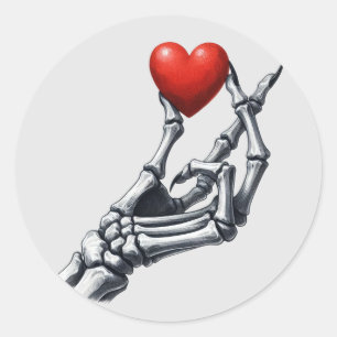 Skelet Hand Lifting Red Heart Ronde Sticker