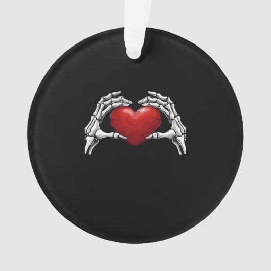 Skelet handen houden een Red Heart Design Classic Ornament (voorkant)