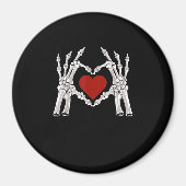 Skelet handen vormen een hart met een rood hart magneet (Voorkant)