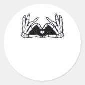 Skelet in de handen van een hart ronde sticker (Voorkant)