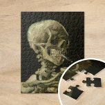 Skelet met een brandende sigaret | Van Gogh Legpuzzel<br><div class="desc">De schedel van een Skelet met Burning Cigarette (1886) door de Nederlandse postimpressionist Vincent Van Gogh. Origineel schilderij is een olie op het canvas, waarschijnlijk afkomstig van de korte tijd die Van Gogh heeft doorgebracht om les te geven aan de Kunstacademie in Antwerpen. De brandende sigaret was waarschijnlijk bedoeld als...</div>