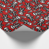 Skelet op rode achtergrond cadeaupapier (Hoek)