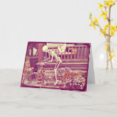 Skelet rijdt op de fiets Fijne Halloween Spooky Kaart (Gele Bloem)