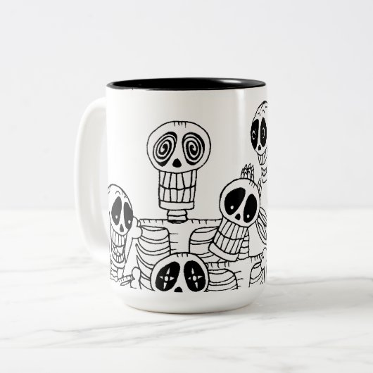 Skeletten mok met twee toontonen (Voorkant links)