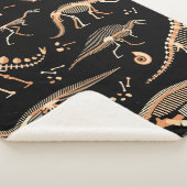 Skeletten van dinosaurussen en fossielenpatroon sherpa deken (3/4)