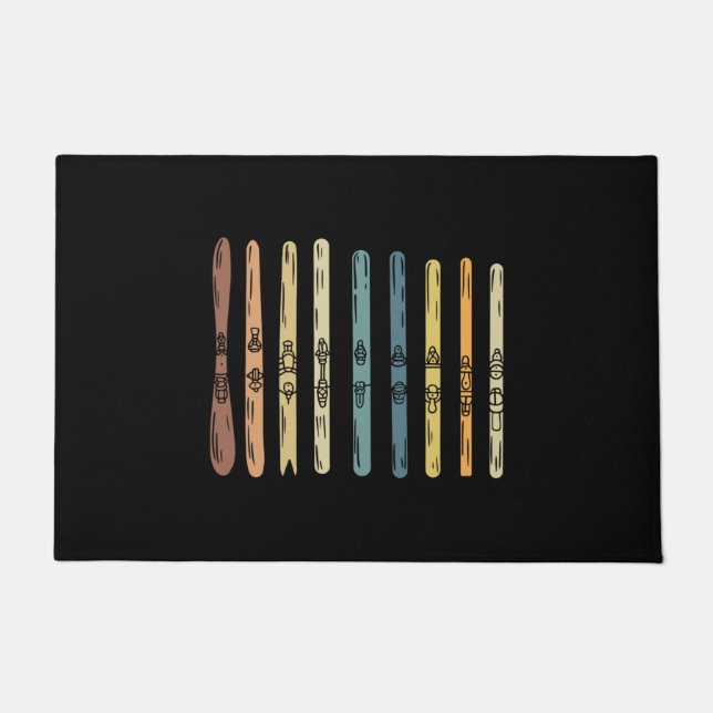 Skiën - Collectie van skistokken Deurmat (Voorkant)