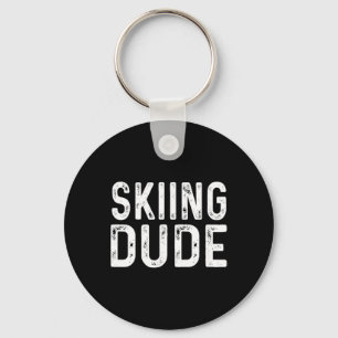 Skiende vent in nood skisporter besneeuwde berg Al Sleutelhanger