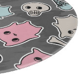 Skulls en harten op zwarte achtergrond snijplank (Hoek)