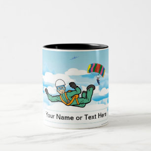 Skydiving - Cartoon opa door PrintedPerfection Tweekleurige Koffiemok