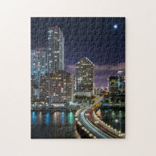 Skyline of Miami city with bridge at night Legpuzzel