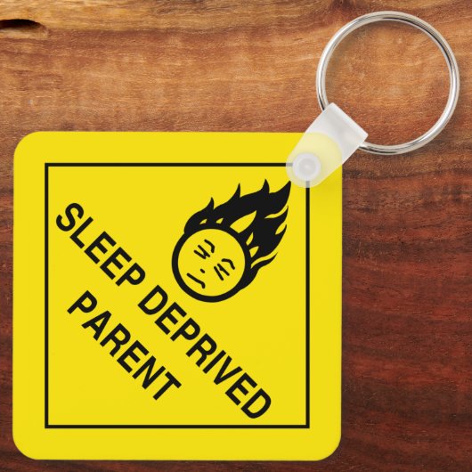 Slaapafhankelijke ouder sleutelhanger (Achterkant)