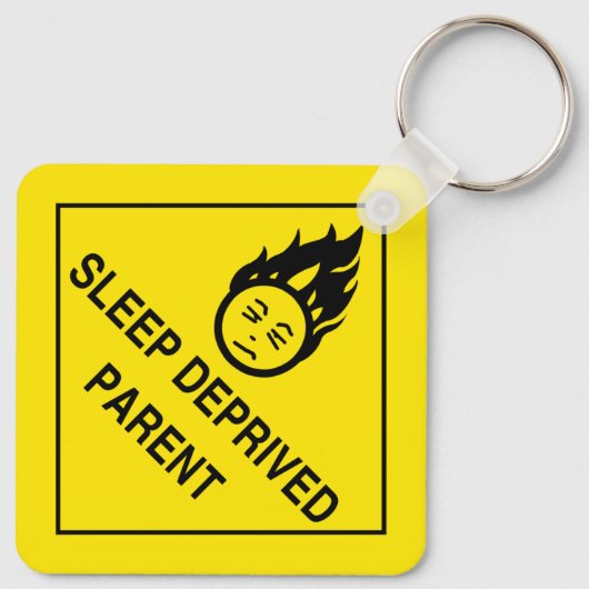 Slaapafhankelijke ouder sleutelhanger (Achterkant)