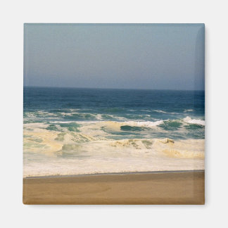 slagroom golven raken strand magneet