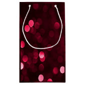 Slankerend kerstfeest met rode kerstlampjes Bokeh  Klein Cadeauzakje (Achterkant)