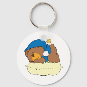 slapen op een kussen met schattig teddybeer sleutelhanger