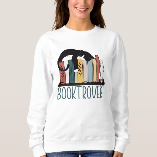 Slapen zwarte witte kat op boekenplank booktrovert trui (Voorkant)