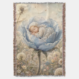 Slapende baby in blauwe bloem deken