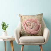 Slapende baby in roze bloem kussen (Stoel)