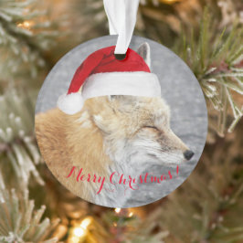 Slaperige rode vos met rode kerstmuts vakantie ornament