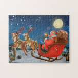 Slapje en rendier van de kerstman legpuzzel<br><div class="desc">Charmant puzzel van de Kerstman in zijn slee en rendier onder een volle maan.</div>