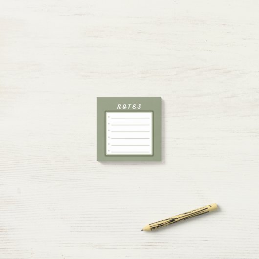 Slauw-groene schattige kogelpunten post-it® notes (Op bureau)