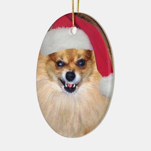 Slechte kerstversiering keramisch ornament (Links)