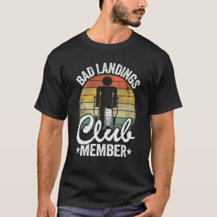 Slechte landingen, lid van de club krijgt een goed t-shirt