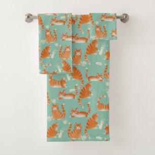 Slechte Oranje Tabby Cats kloppen spul over patroo Bad Handdoek