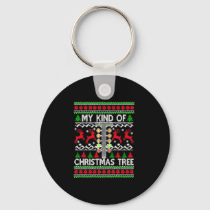 Sleep racekerstboom met een lelijke kerstkeuken sleutelhanger