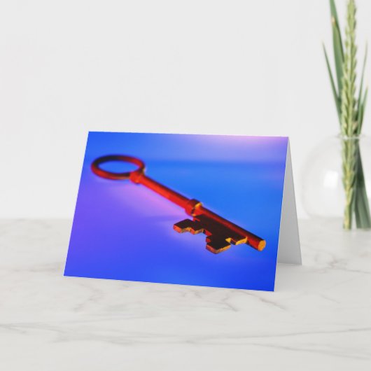 SLEUTEL MET BLAUWE ACHTERGROND KAART (Voorkant)